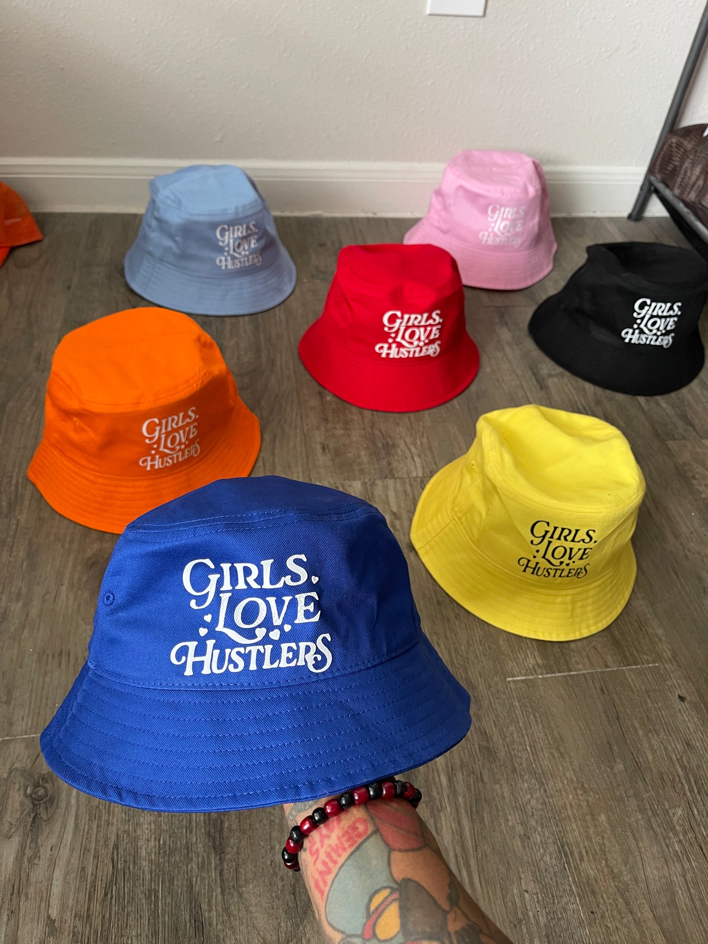 Girls Love Hustlers Bucket hats